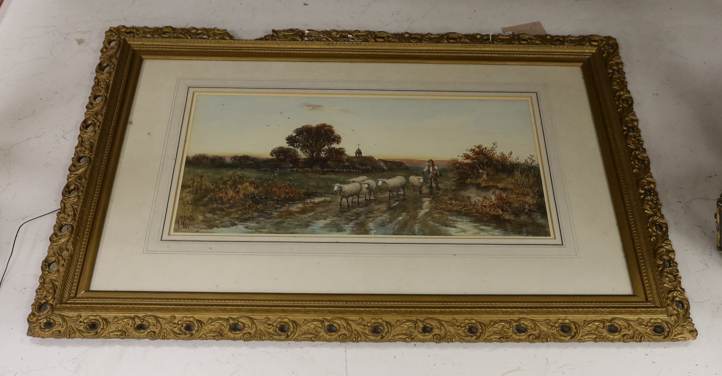 J. Wilton, watercolour, Shepherd and flock returning home, signed, 25 x 51cm